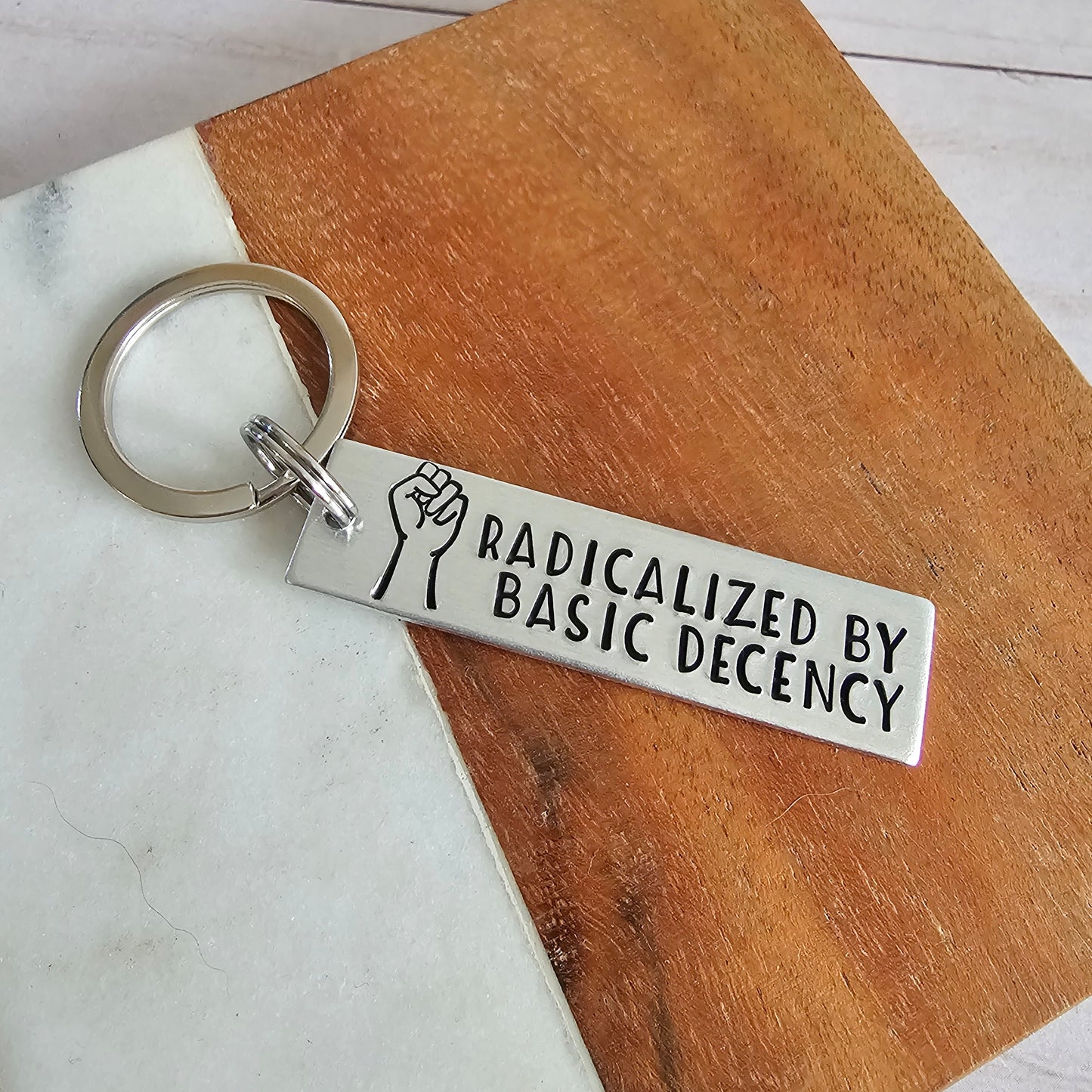 Radicalized by Basic Decency Keychain, Lightweight Silver Hand Stamped Keychain