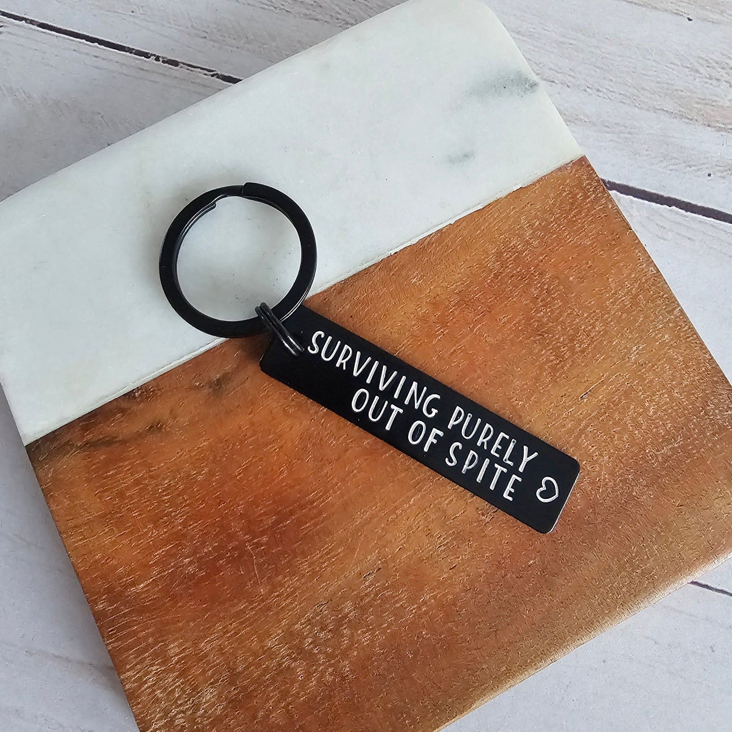 Surviving Purely Out Of Spite Black Aluminum Keychain, Lightweight Funny Hand Stamped Key Chain
