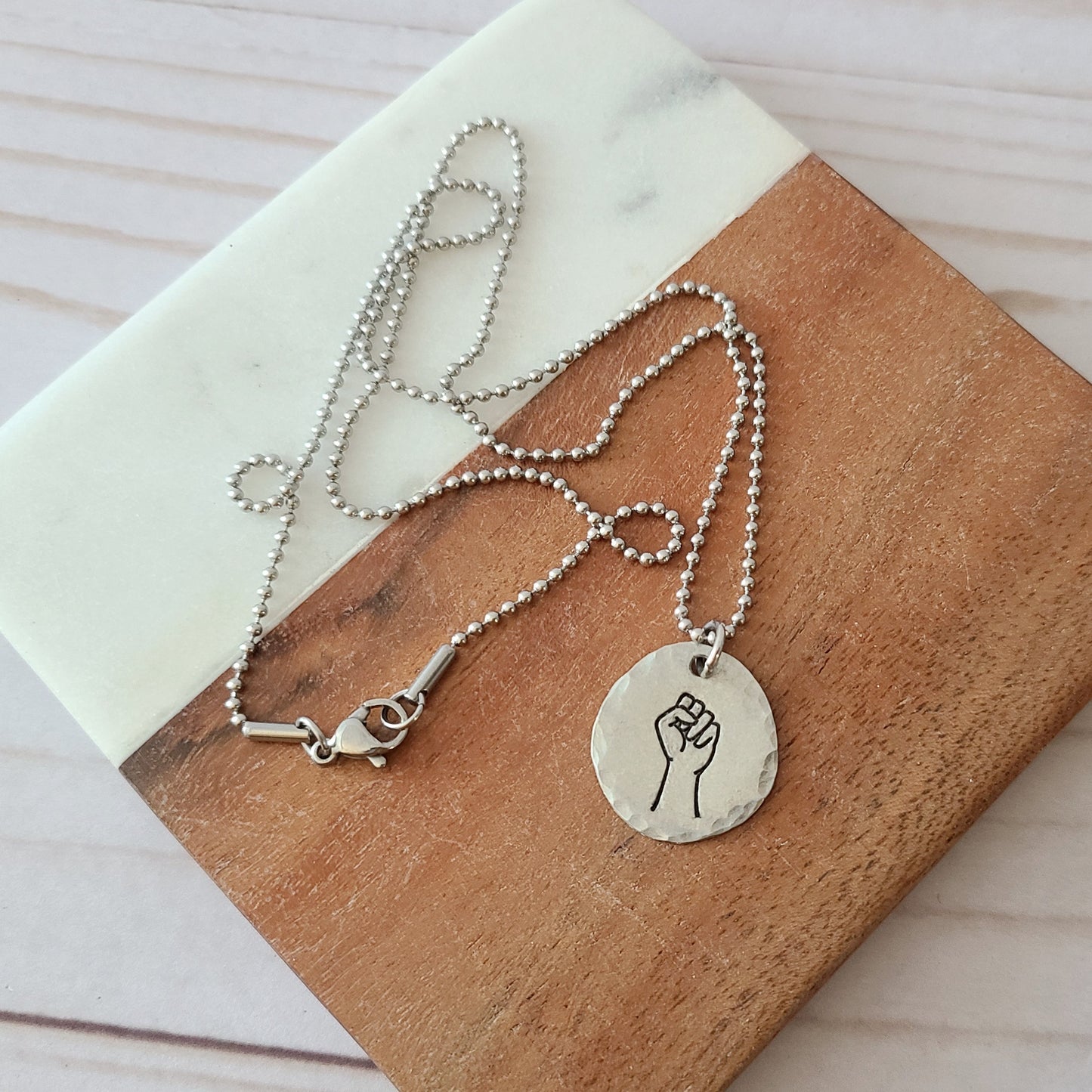 Resist Fist Necklace