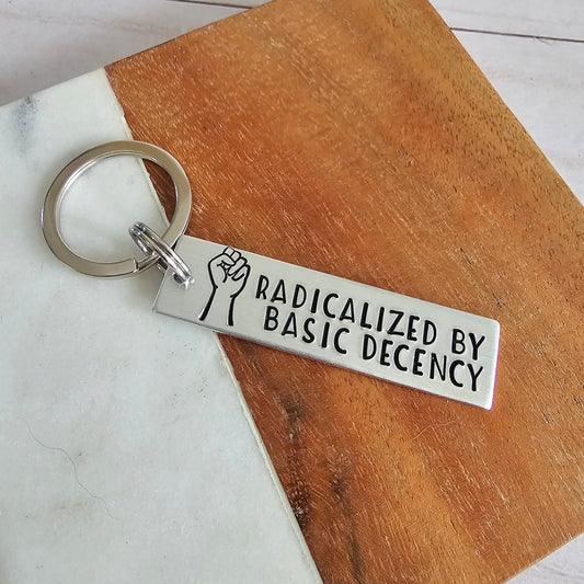 Radicalized by Basic Decency Keychain, Lightweight Silver Hand Stamped Keychain