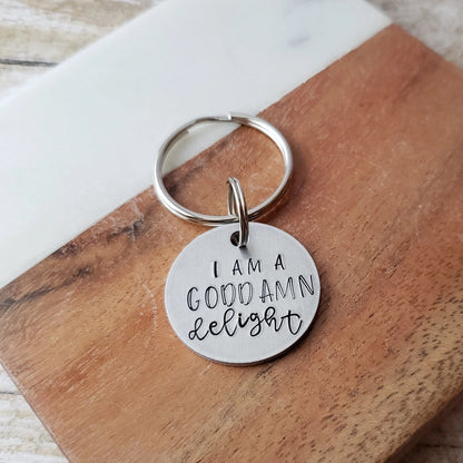 I Am A Goddamn Delight Keychain