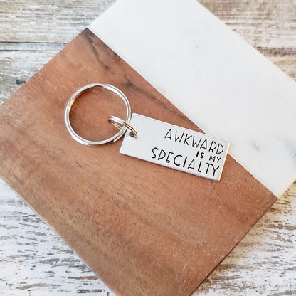 Awkward Is My Specialty Keychain