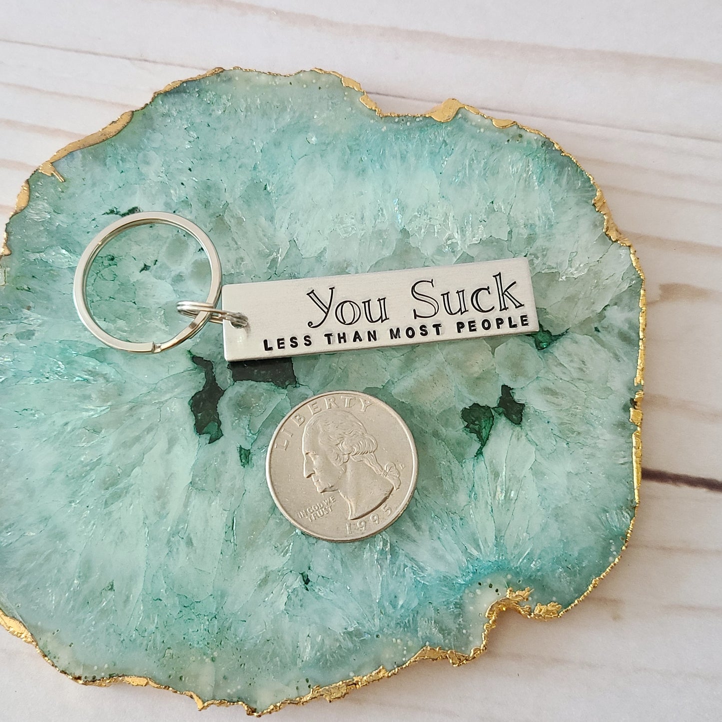 You Suck Less Than Most People Key Chain