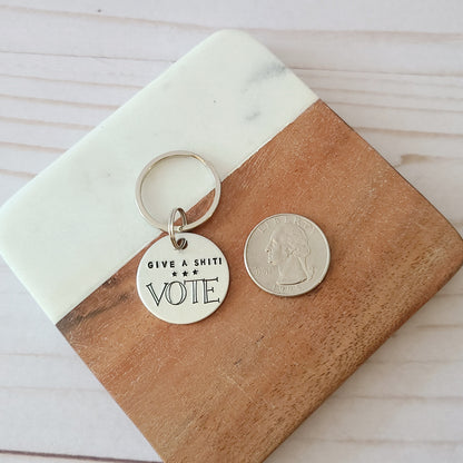 Give A Shit! Vote Keychain