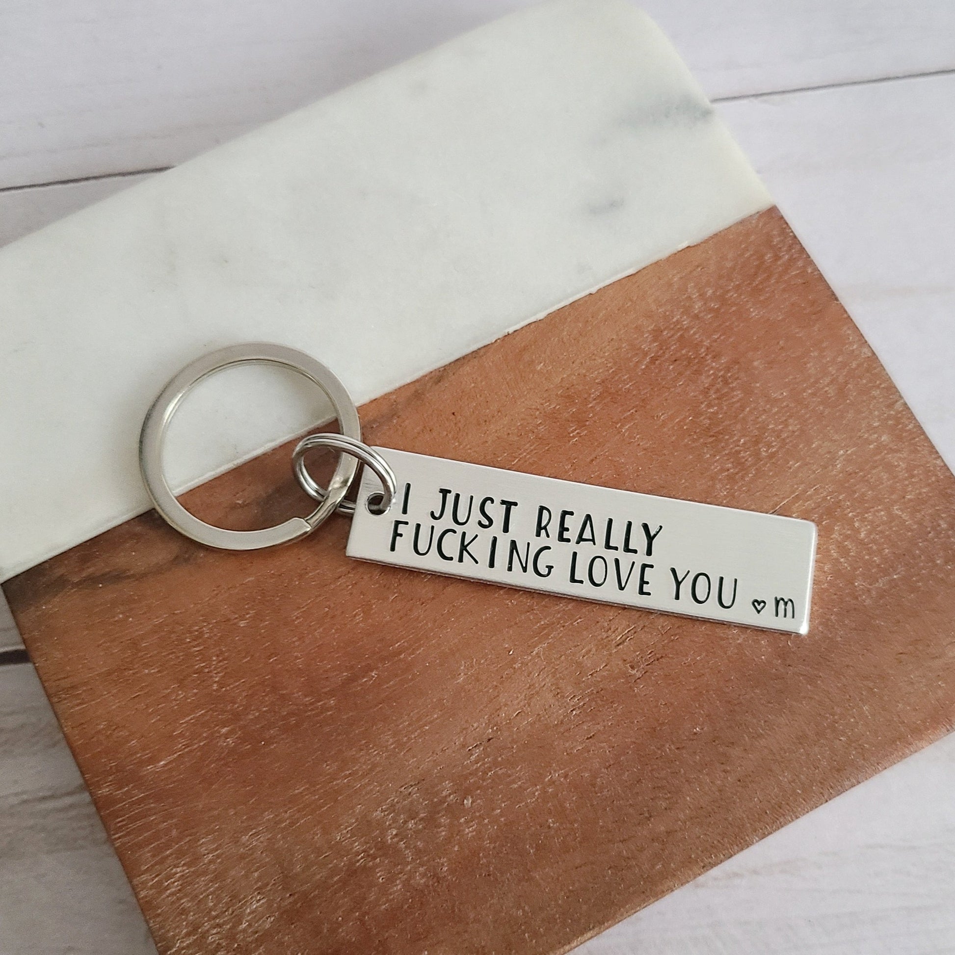 Silver Metal Keychain that is handstamped to read I Just Really Fucking Love You heart initiall