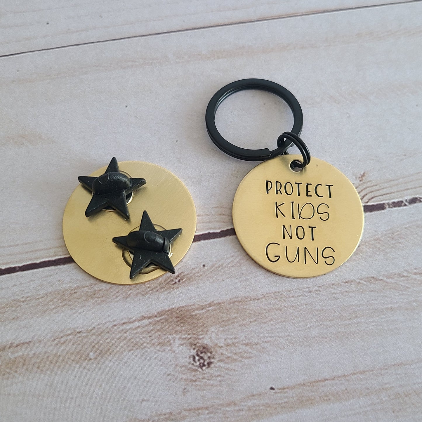 Protect Kids Not Guns Brass Pin or Keychain
